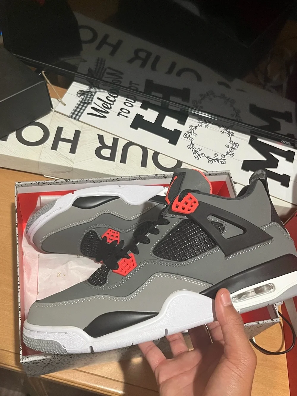 Jordan Retro 4 Sneakers in Grey, Black & Red Accent